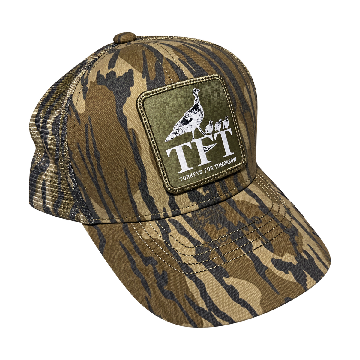 Right three-quarter view of the Bretmor Mossy Oak Bottomland mesh cap showing its TFT hen-and-poults patch and camouflage mesh.