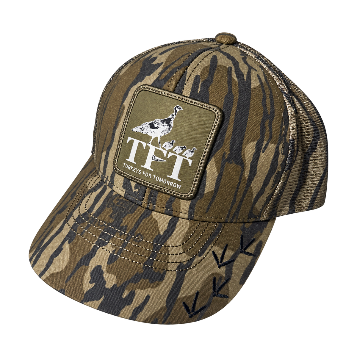 Left three-quarter view of the Bretmor Mossy Oak Bottomland mesh cap with TFT hen-and-poults patch and turkey-track embroidery.